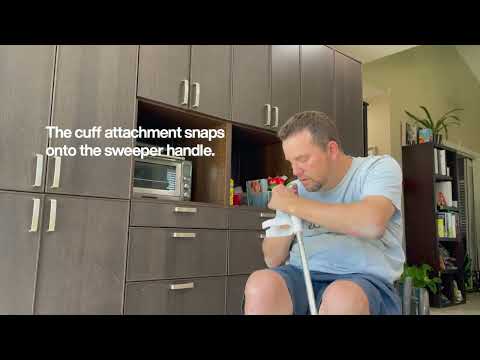 In this video Mark demonstrates how he uses an adaptive cuff with a Swiffer Sweeper.  The adaptive cuff allows him to sweep the floors with limited hand dexterity while sitting in his manual wheelchair.  The cuff snaps onto the handle of the sweeper and allows Mark to sweep the floor comfortably from a seated position.